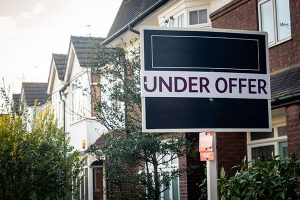 making an offer on a house before selling your own